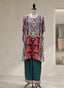 Relaxed kaftan tunic with solid wide-leg trousers.