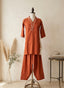 Terracotta Rust V-Neck Kurta Set with Afghani Trousers and Lace Appliqué Detailing
