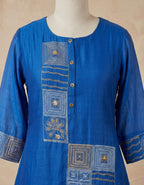 Flared A-line short kurta with matching wide-leg trousers.