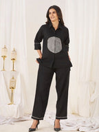 Sophisticated two-piece ensemble that blends minimalist tailoring