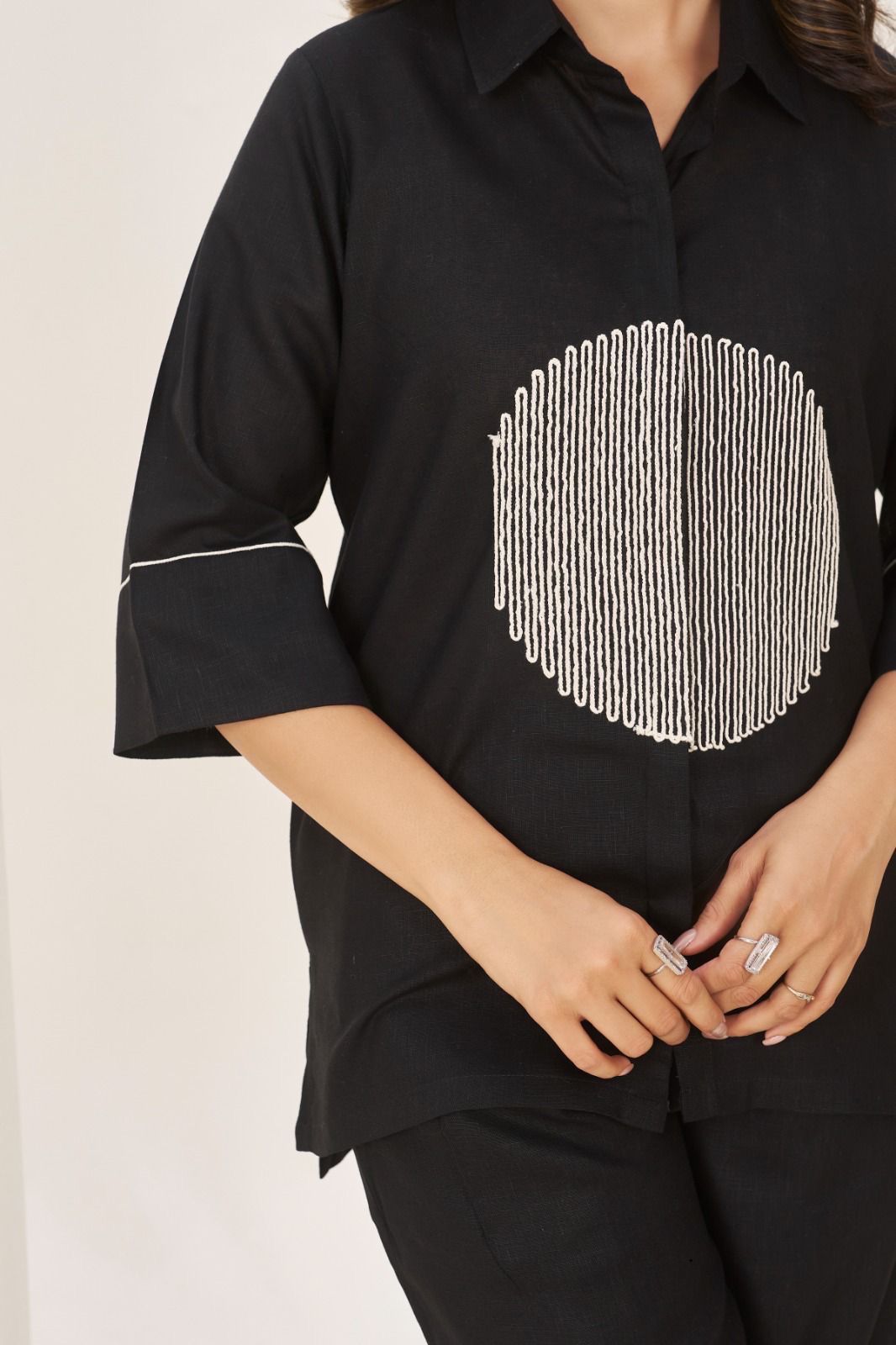 Sophisticated two-piece ensemble that blends minimalist tailoring